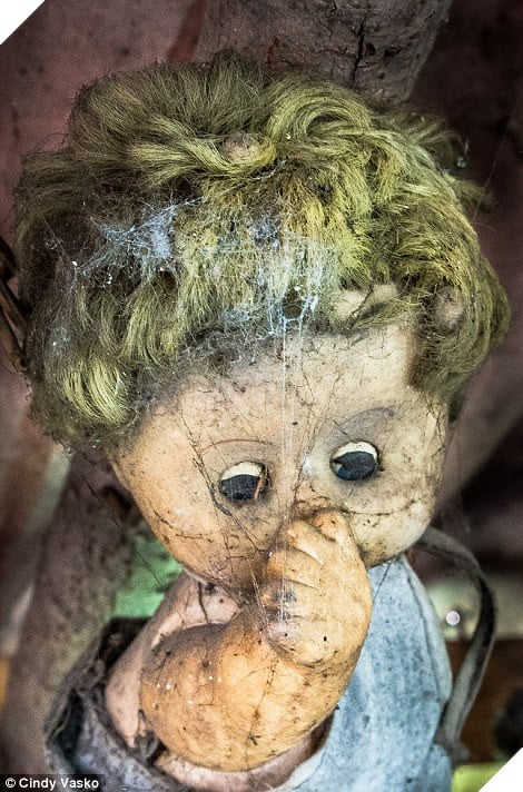 Decay: Since his death in 2001, the area known as the 'chinampas' has become a tourist hot spot where visitors hang up there own dolls (pictured)