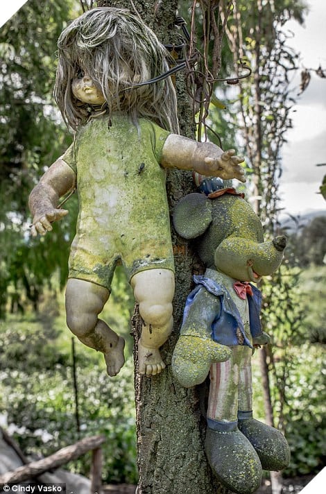 Decay: Since his death in 2001, the area known as the 'chinampas' has become a tourist hot spot where visitors hang up there own dolls (pictured)