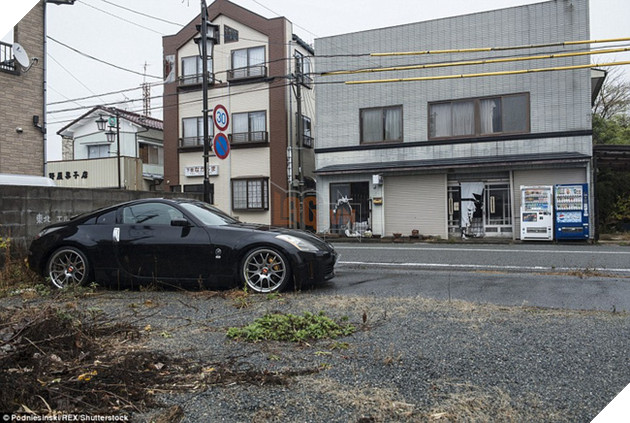 Chùm ảnh: Những bức hình ám ảnh về thị trấn ma sau thảm họa nhà máy hạt nhân Fukushima, Nhật Bản 2011 - Ảnh 10.