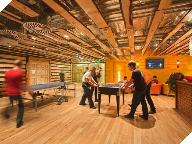 Employees in Moscow can play table tennis and foosball inside this cozy, wood-paneled room.