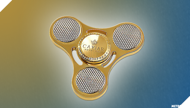 Nhiều tiền quá chẳng biết làm gì thì mua con quay fidget spinner bằng vàng để chơi - Ảnh 1.