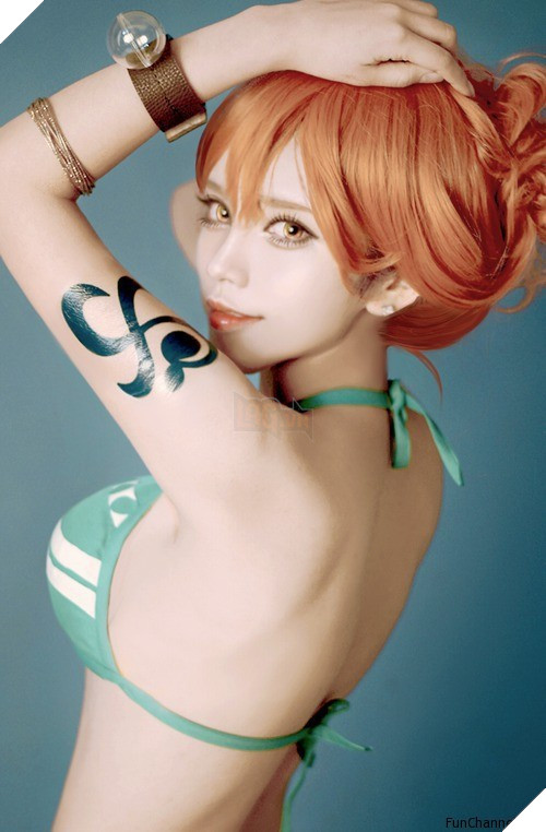 Bỏng mắt với những hình ảnh cosplay miêu tặc Nami trong One Piece khiến các fan đứng ngồi không yên - Ảnh 4.