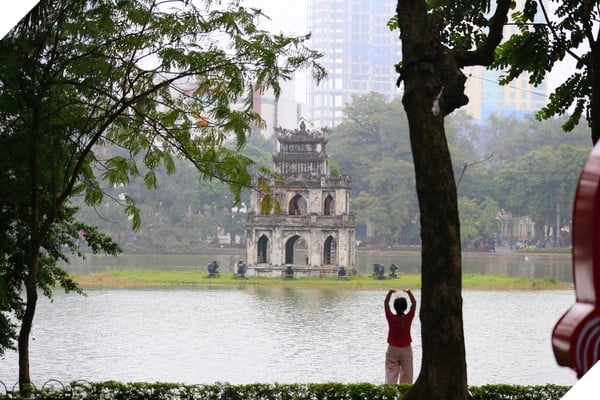 Ngay mong 1 Tet: Co 1 Ha Noi va Sai Gon binh yen den la 11 Hồ Gươm sớm đầu năm: yên bình và trong trẻo