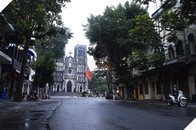 Ngay mong 1 Tet: Co 1 Ha Noi va Sai Gon binh yen den la 2 Hà Nội, Sài Gòn khác lạ Mùng một Tết