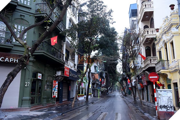 Ngay mong 1 Tet: Co 1 Ha Noi va Sai Gon binh yen den la 3 Hà Nội, Sài Gòn khác lạ Mùng một Tết