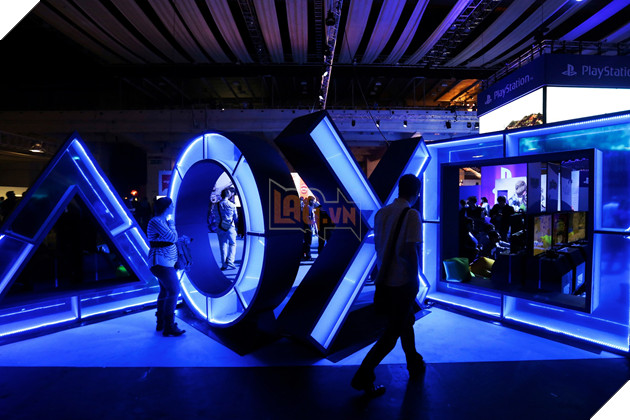 blue illuminated sculptures of the playstation button symvols