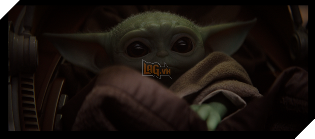 baby Yoda peaking at the viewer