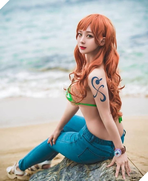 One Piece: Bỏng mắt với bộ ảnh cosplay miêu tặc Nami mặt xinh, dáng chuẩn khiến fans đứng ngồi không yên - Ảnh 9.